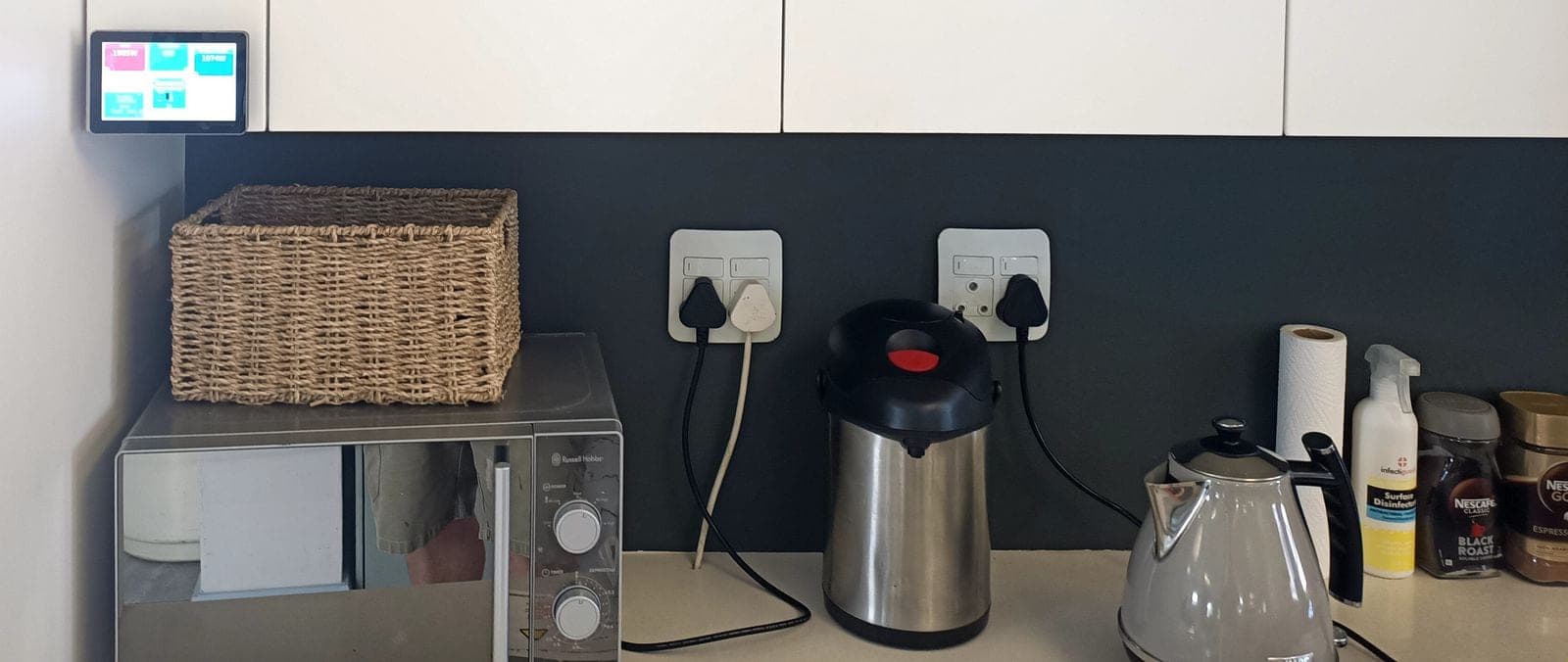 System controller mounted alongside distribution enclosures