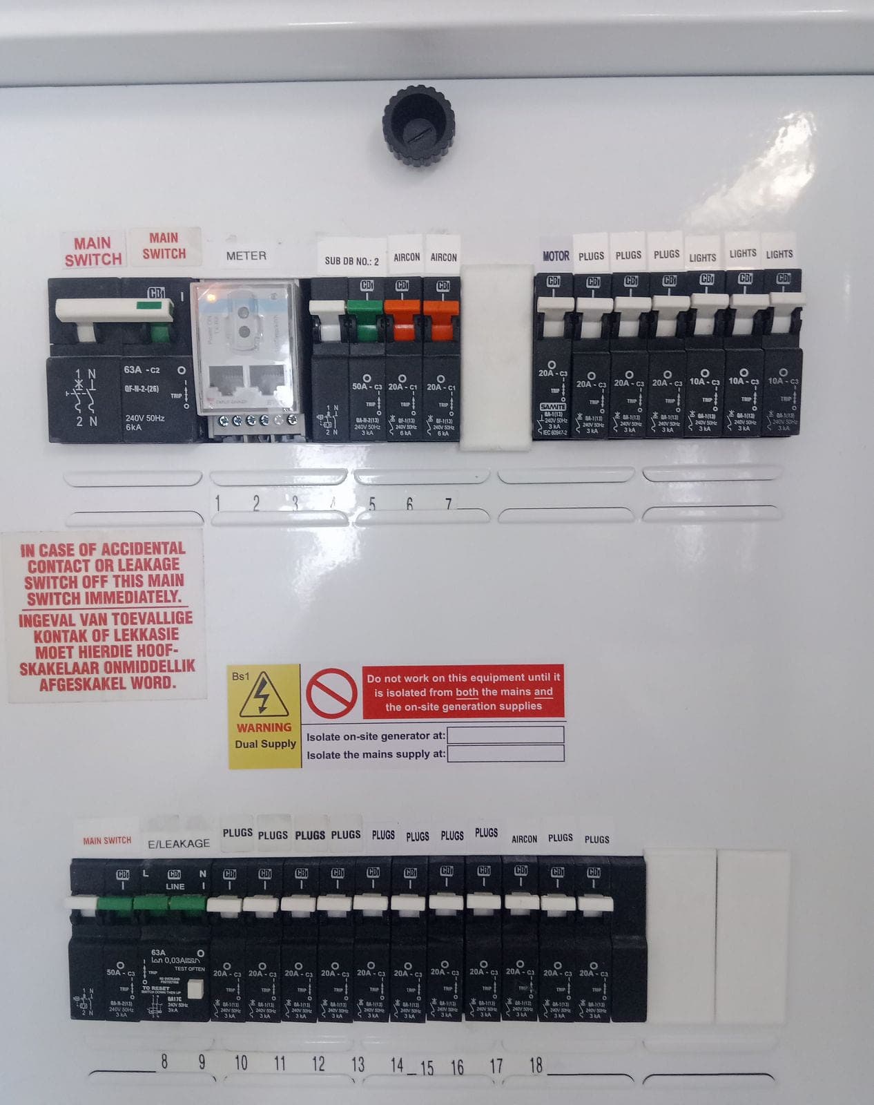 Main AC distribution board with the cover removed showing labelled circuits