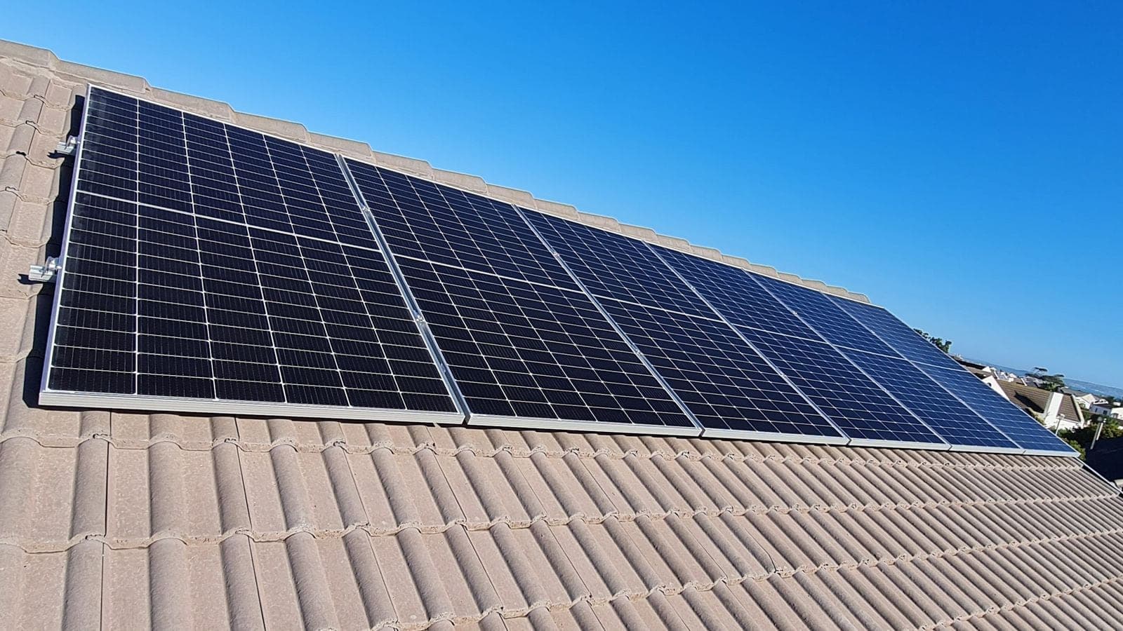 Solar array installed across a tiled roof plane in Langebaan
